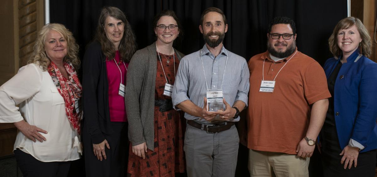 SMILE staff and partners with award